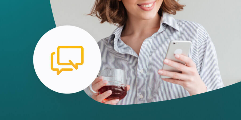 Women using mobile phone to look at text marketing message.