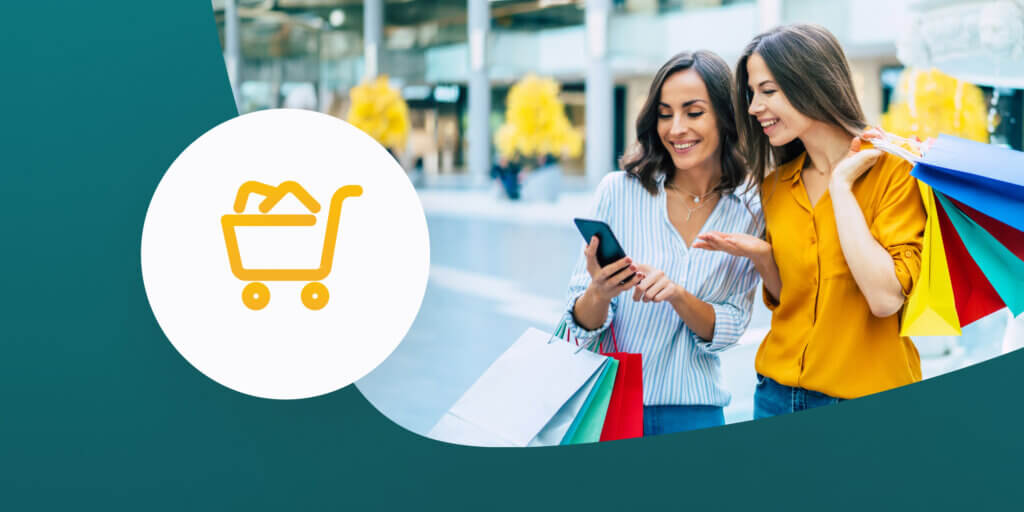 graphic of two women with shopping bags receiving SMS marketing from brands during peak trading season